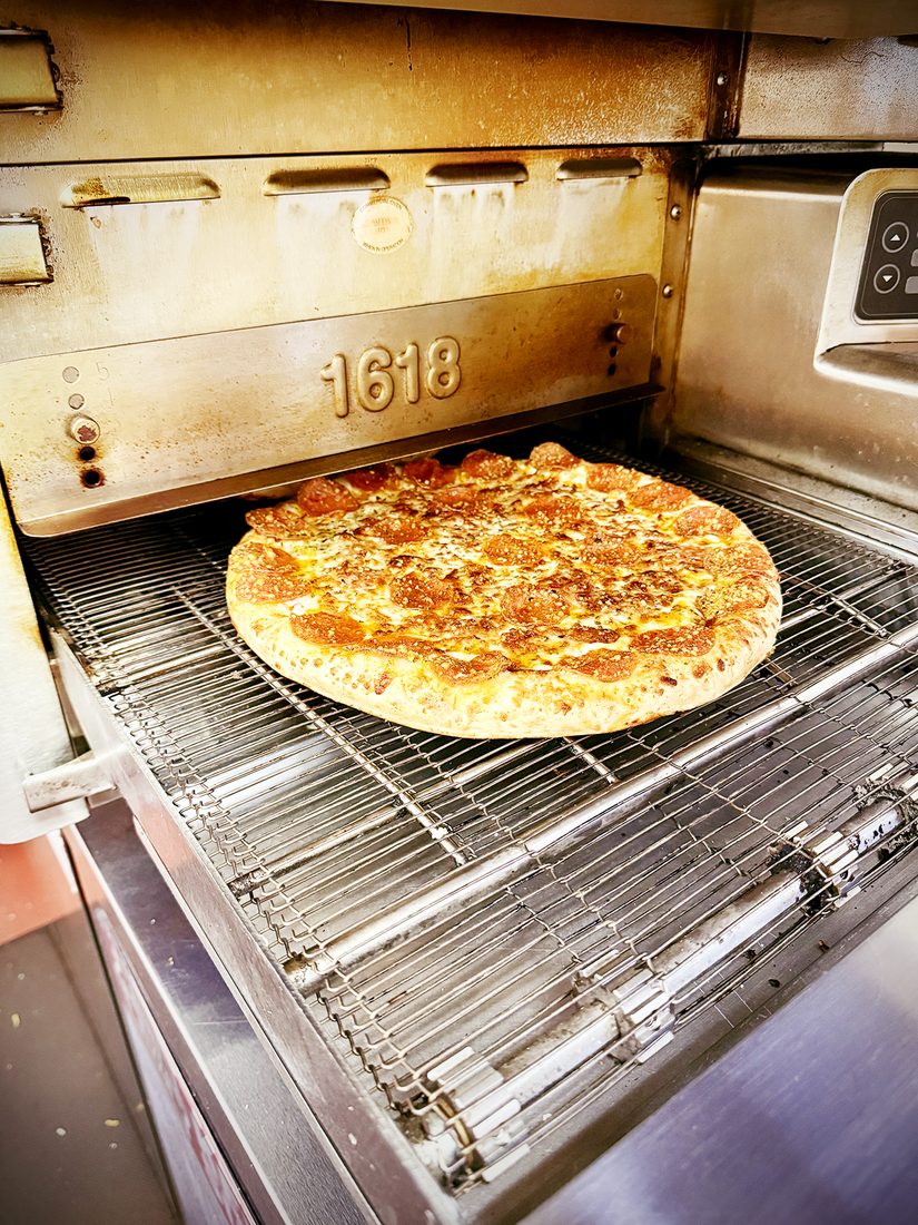 Hunt Brothers Pizza fresh out of the oven